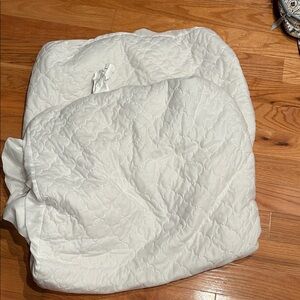 Two Sealy Crib Mattress Protectors